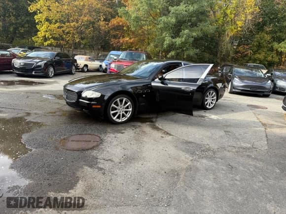 ✅ 2005 Maserati Quattroporte • VIN: ZAMCE39A450018466 • Lot: 90034455. Wystawiony na Copart z przebiegiem 97 331 mil. Bezpłatny archiwum sprzedaży aukcyjnych z USA i szczegółowy raport historii pojazdu na DreamBid. Zdjęcie 15.