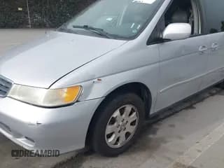 ✅ 2002 Honda Odyssey EX-L • VIN: 5FNRL18782B025934 • Lot: 43774574. Wystawiony na IAAI z przebiegiem 316 957 mil. Bezpłatny archiwum sprzedaży aukcyjnych z USA i szczegółowy raport historii pojazdu na DreamBid. Zdjęcie 6.