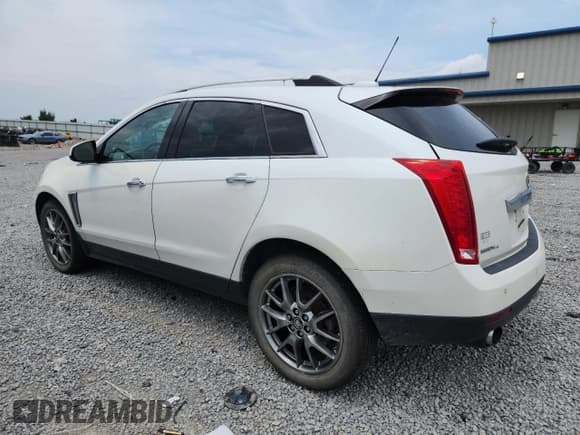 ✅ 2016 Cadillac SRX Premium Collection • VIN: 3GYFNDE39GS546265 • Lot: 65597945. Wystawiony na Copart z przebiegiem 145 591 mil. Bezpłatny archiwum sprzedaży aukcyjnych z USA i szczegółowy raport historii pojazdu na DreamBid. Zdjęcie 2.