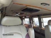 ✅ 2004 Chevrolet Express Passenger • VIN: 1GBFG15T441149305 • Lot: 43040447. Listed on IAAI with 169,635 mi. Free auction sales archive from the USA and detailed vehicle history report at DreamBid. Image 13.