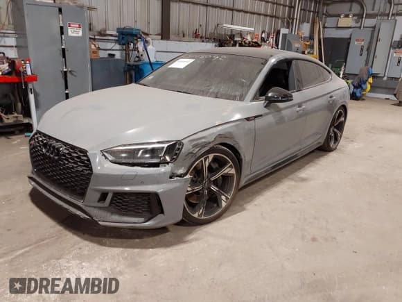 ✅ 2019 Audi RS 5 Sportback • VIN: WUABWCF59KA900990 • Lot: 43105092. Listed on IAAI with 71,658 mi. Free auction sales archive from the USA and detailed vehicle history report at DreamBid. Image 2.