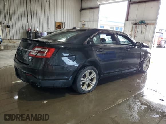 ✅ 2014 Ford Taurus SEL • VIN: 1FAHP2H8XEG162596 • Lot: 56676965. Listed on Copart with Not provided. Free auction sales archive from the USA and detailed vehicle history report at DreamBid. Image 3.