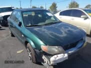 ✅ 2002 Mazda Protege DX • VIN: JM1BJ225021620967 • Lot: 43484388. Wystawiony na IAAI z przebiegiem 200 574 mil. Bezpłatny archiwum sprzedaży aukcyjnych z USA i szczegółowy raport historii pojazdu na DreamBid. Zdjęcie 6.