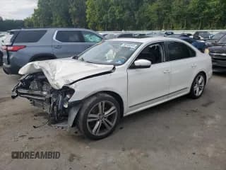 ✅ 2014 Volkswagen Passat SEL Premium • VIN: 1VWCT7A30EC017695 • Lot: 80169345. Listed on Copart with 166,947 mi. Free auction sales archive from the USA and detailed vehicle history report at DreamBid. Image 1.