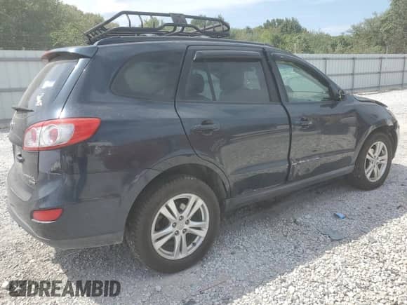 2011 Hyundai Santa Fe SE z VIN 5XYZHDAG4BG061528, wystawiony jako Copart lot #70642964 z przebiegiem 168 666 mil mil oraz Szkoda całkowita • Salvage title. Historia ofert i sprzedaży dostępna na DreamBid. Obrazek 3.