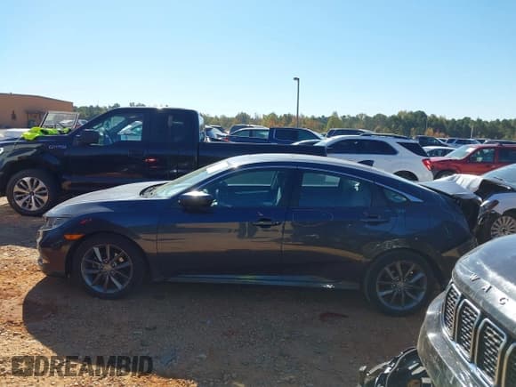 ✅ 2019 Honda Civic EX • VIN: 19XFC1F30KE009977 • Lot: 43429352. Listed on IAAI with 30,532 mi. Free auction sales archive from the USA and detailed vehicle history report at DreamBid. Image 15.