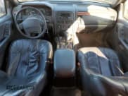 ✅ 1999 Jeep Grand Cherokee Laredo • VIN: 1J4GW58N8XC736438 • Лот: 88605625. Опубликован ранее на Copart с пробегом 181 612 миль. Бесплатный доступ к архиву аукционных продаж из США и подробный отчёт об истории автомобиля на DreamBid. Изображение 8.