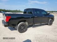 ✅ 2018 Nissan Titan Platinum Reserve • VIN: 1N6BA1F43JN525223 • Lot: 67204495. Listed on Copart with 112,352 mi. Free auction sales archive from the USA and detailed vehicle history report at DreamBid. Image 3.