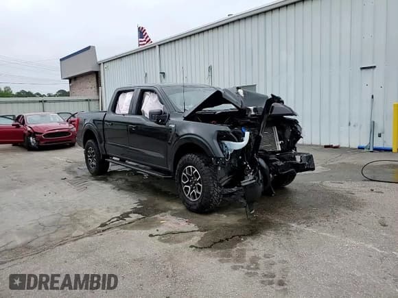 ✅ 2023 Ford F-150 Lariat • VIN: 1FTFW1E82PKD42707 • Lot: 54882135. Wystawiony na Copart z przebiegiem 23 536 mil. Bezpłatny archiwum sprzedaży aukcyjnych z USA i szczegółowy raport historii pojazdu na DreamBid. Zdjęcie 13.