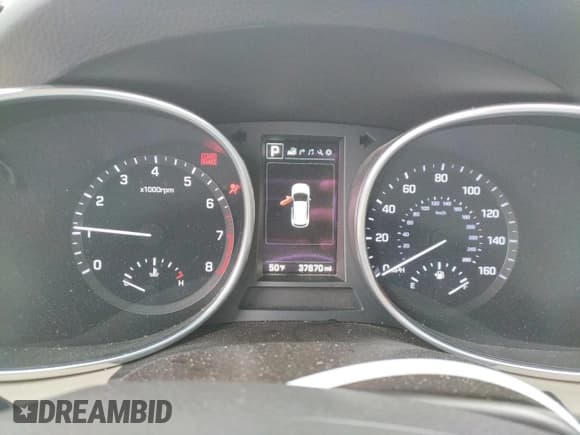 ✅ 2018 Hyundai Santa Fe 2.4L • VIN: 5XYZU3LB0JG560087 • Лот: 36490833. Опубликован ранее на Copart с пробегом 37 870 миль. Бесплатный доступ к архиву аукционных продаж из США и подробный отчёт об истории автомобиля на DreamBid. Изображение 9.