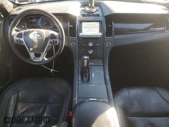 ✅ 2016 Ford Taurus Limited • VIN: 1FAHP2F84GG112198 • Лот: 87381795. Опубликован ранее на Copart с пробегом 129 641 миль. Бесплатный доступ к архиву аукционных продаж из США и подробный отчёт об истории автомобиля на DreamBid. Изображение 8.