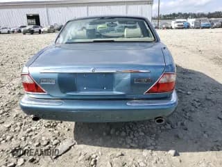 ✅ 2000 Jaguar XJ • VIN: SAJDA14C4YLF17633 • Лот: 74607544. Опубликован ранее на Copart с пробегом 89 114 миль. Бесплатный доступ к архиву аукционных продаж из США и подробный отчёт об истории автомобиля на DreamBid. Изображение 6.