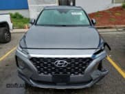 ✅ 2019 Hyundai Santa Fe SE • VIN: 5NMS2CAD3KH010255 • Lot: 65184374. Wystawiony na Copart z przebiegiem 84 927 mil. Bezpłatny archiwum sprzedaży aukcyjnych z USA i szczegółowy raport historii pojazdu na DreamBid. Zdjęcie 5.