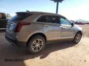 ✅ 2023 Cadillac XT5 FWD Premium Luxury • VIN: 1GYKNCRS1PZ122060 • Lot: 90857135. Listed on Copart with 21,611 mi. Free auction sales archive from the USA and detailed vehicle history report at DreamBid. Image 3.