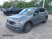 ✅ 2018 Volkswagen Tiguan SEL • VIN: 3VV3B7AX5JM220827 • Lot: 43331469. Listed on IAAI with 80,066 mi. Free auction sales archive from the USA and detailed vehicle history report at DreamBid. Image 2.