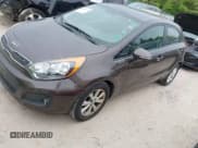 ✅ 2013 Kia Rio SX • VIN: KNADN5A37D6151331 • Lot: 42348350. Listed on IAAI with 106,140 mi. Free auction sales archive from the USA and detailed vehicle history report at DreamBid. Image 2.