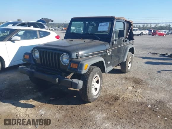✅ 2002 Jeep Wrangler X • VIN: 1J4FA39S62P720324 • Лот: 43660848. Опубликован ранее на IAAI с пробегом 183 970 миль. Бесплатный доступ к архиву аукционных продаж из США и подробный отчёт об истории автомобиля на DreamBid. Изображение 2.