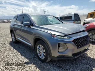 ✅ 2019 Hyundai Santa Fe SE • VIN: 5NMS2CAD6KH094703 • Lot: 55107543. Wystawiony na Copart z przebiegiem 85 031 mil. Bezpłatny archiwum sprzedaży aukcyjnych z USA i szczegółowy raport historii pojazdu na DreamBid. Zdjęcie 4.