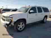 2007 Chevrolet Suburban LTZ with VIN 1GNFC16017R400130, listed as a Copart auction lot 91052515 with 177,895 mi miles and Salvage title. Bid and sale history available at DreamBid. Image 1.