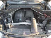 ✅ 2015 BMW X6 xDrive35i • VIN: 5UXKU2C56F0F94958 • Lot: 90822655. Listed on Copart with 127,285 mi. Free auction sales archive from the USA and detailed vehicle history report at DreamBid. Image 12.