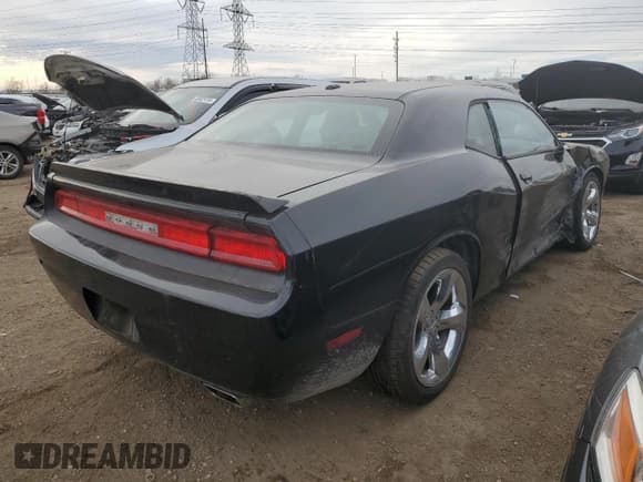 ✅ 2012 Dodge Challenger SXT • VIN: 2C3CDYAG5CH206804 • Lot: 83079794. Wystawiony na Copart z przebiegiem 146 989 mil. Bezpłatny archiwum sprzedaży aukcyjnych z USA i szczegółowy raport historii pojazdu na DreamBid. Zdjęcie 3.