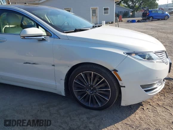 ✅ 2013 Lincoln MKZ • VIN: 3LN6L2JK3DR800385 • Lot: 42966195. Listed on IAAI with 136,612 mi. Free auction sales archive from the USA and detailed vehicle history report at DreamBid. Image 6.