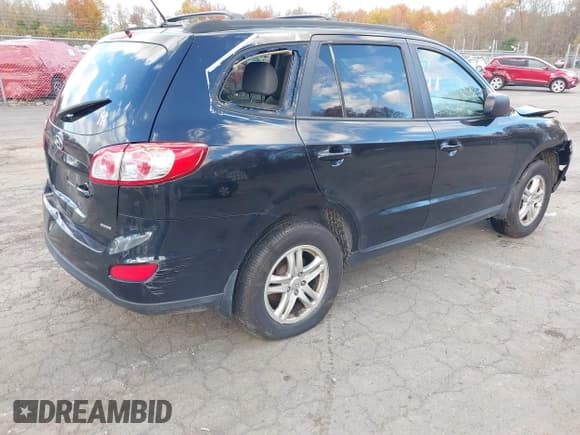 ✅ 2012 Hyundai Santa Fe GLS • VIN: 5XYZGDAB1CG100634 • Lot: 43607374. Listed on IAAI with 178,389 mi. Free auction sales archive from the USA and detailed vehicle history report at DreamBid. Image 4.