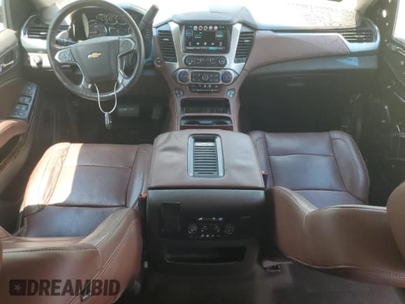 ✅ 2015 Chevrolet Tahoe LTZ • VIN: 1GNSCCKC3FR633581 • Lot: 65729215. Listed on Copart with 135,551 mi. Free auction sales archive from the USA and detailed vehicle history report at DreamBid. Image 8.