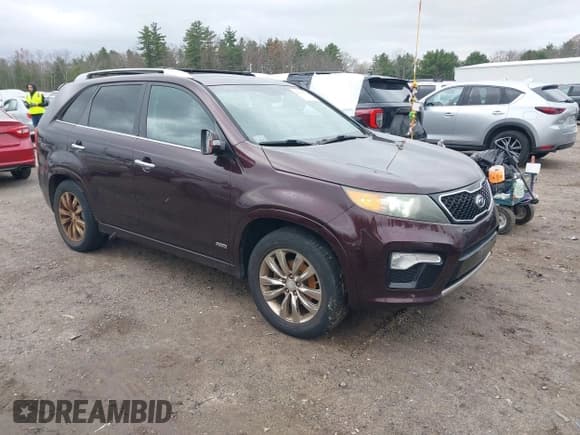 ✅ 2012 Kia Sorento SX • VIN: 5XYKWDA23CG202604 • Lot: 43674761. Listed on IAAI with 143,323 mi. Free auction sales archive from the USA and detailed vehicle history report at DreamBid. Image 1.