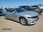 ✅ 2022 Dodge Charger SXT • VIN: 2C3CDXBG5NH138077 • Lot: 70290845. Listed on Copart with 74,946 mi. Free auction sales archive from the USA and detailed vehicle history report at DreamBid. Image 4.