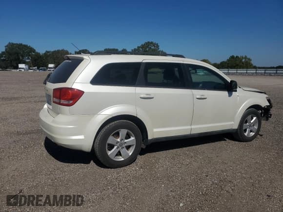 ✅ 2013 Dodge Journey SE • VIN: 3C4PDCAB2DT531780 • Lot: 82429355. Listed on Copart with 164,381 mi. Free auction sales archive from the USA and detailed vehicle history report at DreamBid. Image 3.