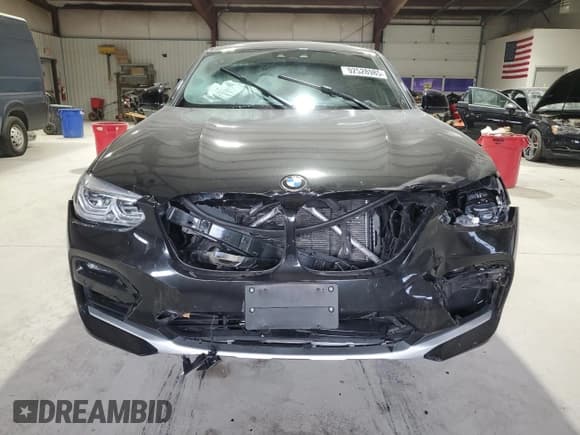 ✅ 2021 BMW X4 xDrive30i • VIN: 5UX2V1C02M9F43235 • Lot: 92528985. Listed on Copart with 38,569 mi. Free auction sales archive from the USA and detailed vehicle history report at DreamBid. Image 5.