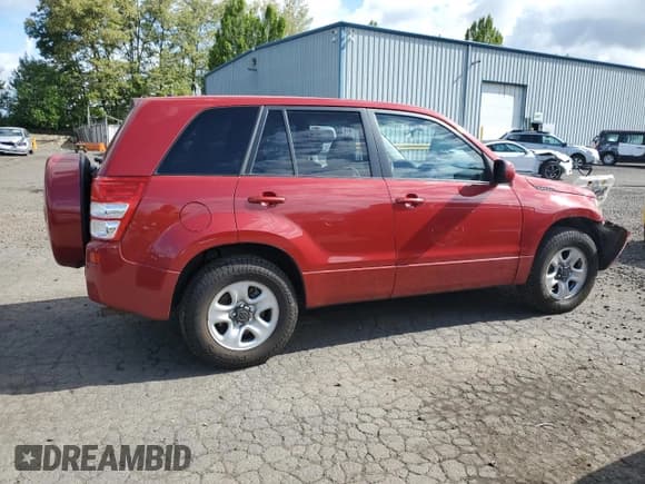 ✅ 2012 Suzuki Grand Vitara Premium • VIN: JS3TD0D20C4101700 • Lot: 57631195. Listed on Copart with 98,021 mi. Free auction sales archive from the USA and detailed vehicle history report at DreamBid. Image 3.