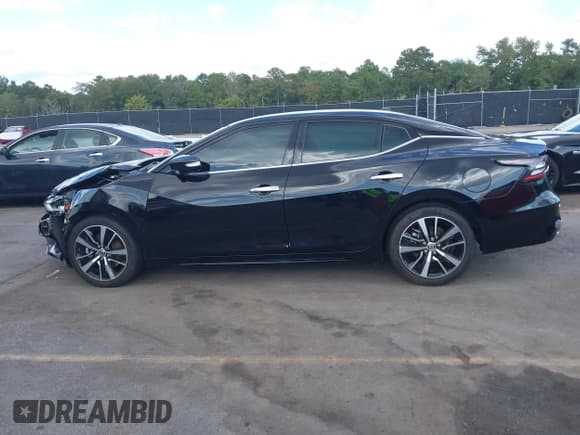 ✅ 2021 Nissan Maxima SV • VIN: 1N4AA6CV4MC511989 • Lot: 43215195. Listed on IAAI with 85,232 mi. Free auction sales archive from the USA and detailed vehicle history report at DreamBid. Image 14.