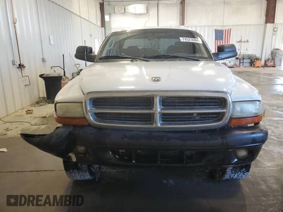 2004 Dodge Dakota Sport с VIN 1D7HG32N34S739646, выставлен на аукционе Copart как лот 74523084 с пробегом 277 000 миль миль и На запчасти • Non repairable. История ставок и продаж доступна на DreamBid. Изображение 5.