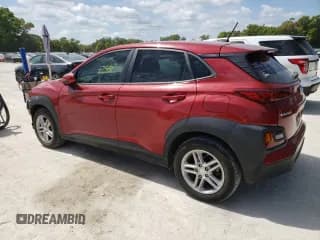 ✅ 2019 Hyundai Kona SE • VIN: KM8K12AA1KU258799 • Лот: 46826174. Опубликован ранее на Copart с пробегом 62 551 миль. Бесплатный доступ к архиву аукционных продаж из США и подробный отчёт об истории автомобиля на DreamBid. Изображение 2.