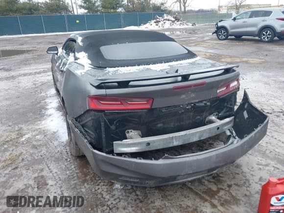 ✅ 2018 Chevrolet Camaro 1LT • VIN: 1G1FB3DX8J0124766 • Lot: 41737430. Listed on IAAI with 101,028 mi. Free auction sales archive from the USA and detailed vehicle history report at DreamBid. Image 3.