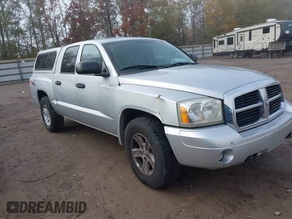 2007 Dodge Dakota SLT с VIN 1D7HW48K67S216227, выставлен на аукционе IAAI как лот 43624034 с пробегом 234 594 миль миль и . История ставок и продаж доступна на DreamBid. Изображение 1.