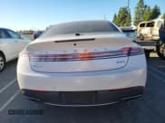✅ 2017 Lincoln MKZ Hybrid Reserve • VIN: 3LN6L5MU0HR660493 • Lot: 90523415. Wystawiony na Copart z przebiegiem Nie podano. Bezpłatny archiwum sprzedaży aukcyjnych z USA i szczegółowy raport historii pojazdu na DreamBid. Zdjęcie 6.