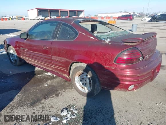✅ 2000 Pontiac Grand Am • VIN: 1G2NE12T5YM799819 • Lot: 43827279. Listed on IAAI with 167,017 mi. Free auction sales archive from the USA and detailed vehicle history report at DreamBid. Image 3.