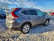 ✅ 2014 Honda CR-V EX-L • VIN: 2HKRM3H77EH552359 • Лот: 93198195. Опубликован ранее на Copart с пробегом 130 773 миль. Бесплатный доступ к архиву аукционных продаж из США и подробный отчёт об истории автомобиля на DreamBid. Изображение 3.