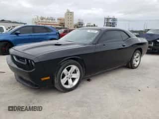 2012 Dodge Challenger SXT z VIN 2C3CDYAG7CH124959, wystawiony jako Copart lot #70822264 z przebiegiem 184 413 mil mil oraz Czysty tytuł • Clean title. Historia ofert i sprzedaży dostępna na DreamBid. Obrazek 1.