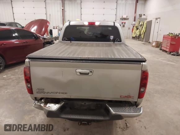 ✅ 2011 GMC Canyon SLT • VIN: 1GTH6NFE2B8131890 • Lot: 43561431. Listed on IAAI with 114,728 mi. Free auction sales archive from the USA and detailed vehicle history report at DreamBid. Image 16.
