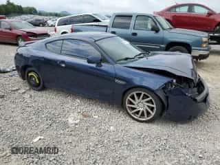 2008 Hyundai Tiburon GT с VIN KMHHN66F68U279201, выставлен на аукционе Copart как лот 61691465 с пробегом 202 765 миль миль и Списание • Salvage title. История ставок и продаж доступна на DreamBid. Изображение 4.