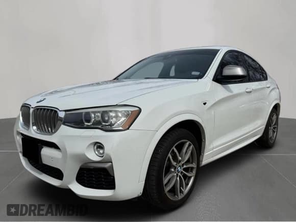 ✅ 2018 BMW X4 M40i • VIN: 5UXXW7C52J0W64992 • Лот: 62238475. Опубликован ранее на Copart с пробегом 97 967 миль. Бесплатный доступ к архиву аукционных продаж из США и подробный отчёт об истории автомобиля на DreamBid. Изображение 2.