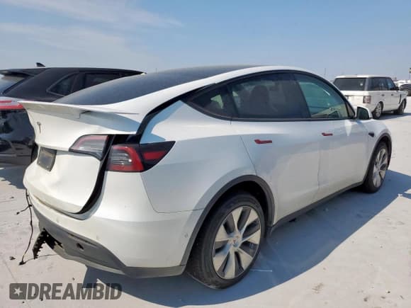 ✅ 2021 Tesla Model Y Long Range • VIN: 5YJYGDEEXMF262593 • Lot: 69035585. Listed on Copart with 68,563 mi. Free auction sales archive from the USA and detailed vehicle history report at DreamBid. Image 3.