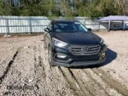 ✅ 2018 Hyundai Santa Fe 2.4L • VIN: 5XYZU3LB7JG550186 • Лот: 75326183. Опубликован ранее на Copart с пробегом 92 541 миль. Бесплатный доступ к архиву аукционных продаж из США и подробный отчёт об истории автомобиля на DreamBid. Изображение 11.