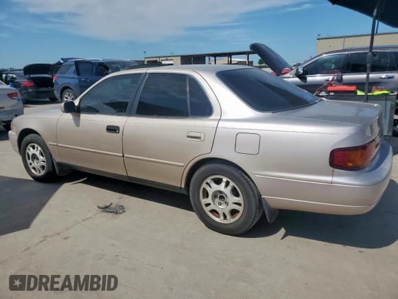 ✅ 1996 Toyota Camry LE • VIN: 4T1BF12K4TU132313 • Lot: 57452045. Listed on Copart with 204,353 mi. Free auction sales archive from the USA and detailed vehicle history report at DreamBid. Image 2.