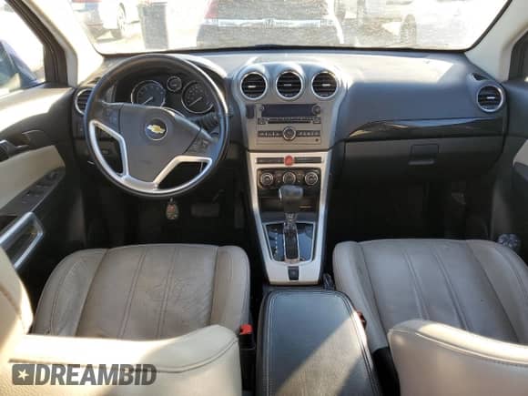 2013 Chevrolet Captiva Sport LTZ z VIN 3GNAL4EK4DS556606, wystawiony jako Copart lot #84316404 z przebiegiem 143 372 mil mil oraz Czysty tytuł • Clean title. Historia ofert i sprzedaży dostępna na DreamBid. Obrazek 8.