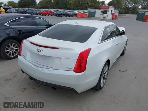 ✅ 2015 Cadillac ATS • VIN: 1G6AH1R38F0101010 • Лот: 43378588. Опубликован ранее на IAAI с пробегом 108 115 миль. Бесплатный доступ к архиву аукционных продаж из США и подробный отчёт об истории автомобиля на DreamBid. Изображение 4.